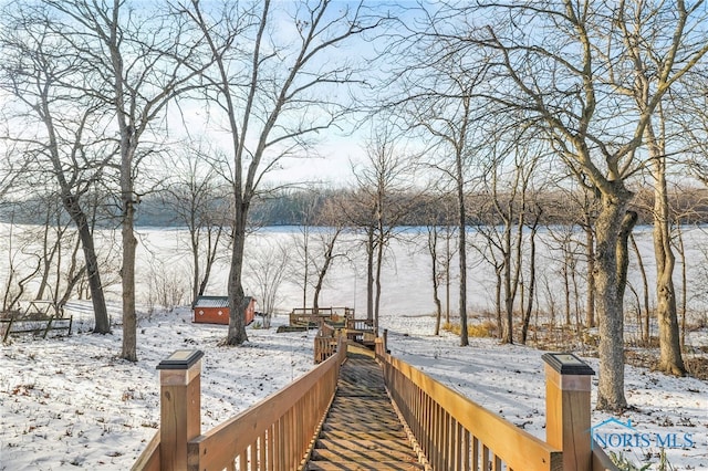 exterior space with a water view