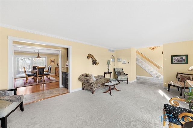 sitting room featuring carpet flooring