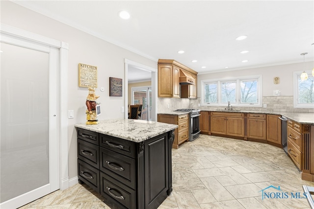 kitchen featuring crown molding, light stone countertops, stainless steel stove, decorative backsplash, and sink