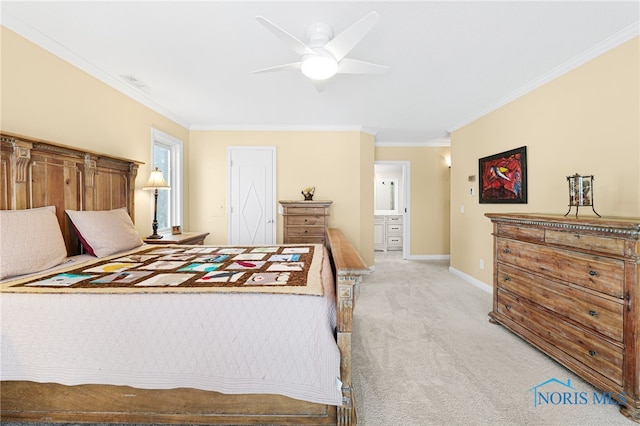 bedroom featuring ceiling fan, ensuite bath, light carpet, and ornamental molding