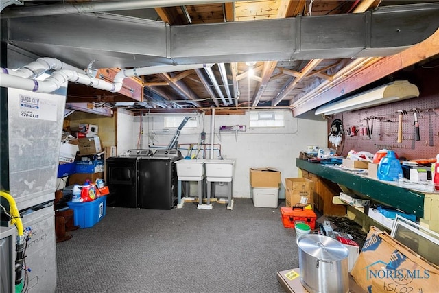 basement with carpet and washer and clothes dryer