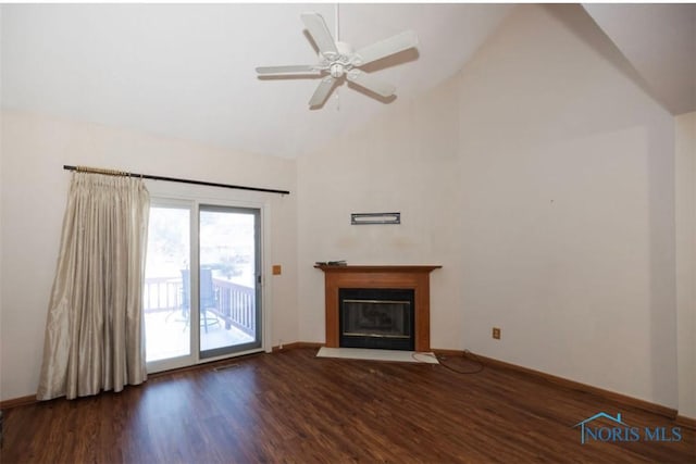 unfurnished living room featuring high vaulted ceiling, dark wood-type flooring, and ceiling fan