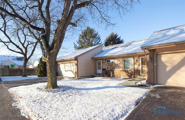 single story home with a garage