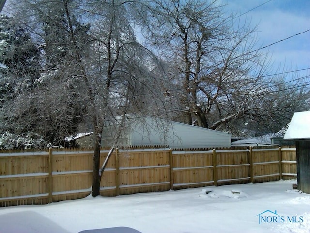 view of snowy yard