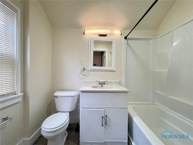 full bathroom featuring tile patterned flooring, vanity, toilet, vaulted ceiling, and shower / bathtub combination