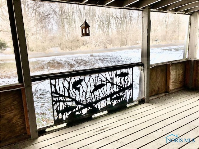 view of snow covered deck