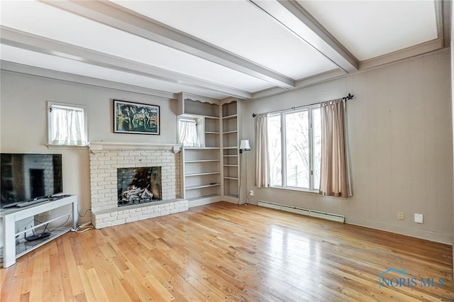 unfurnished living room featuring beamed ceiling, wood-type flooring, a brick fireplace, a baseboard heating unit, and built in features