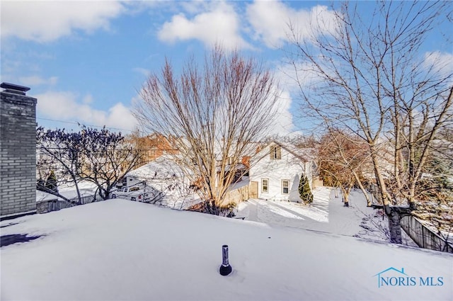 view of snowy yard