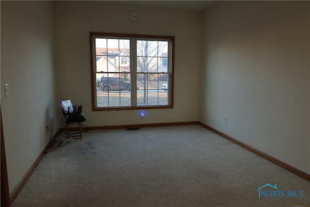 view of carpeted spare room