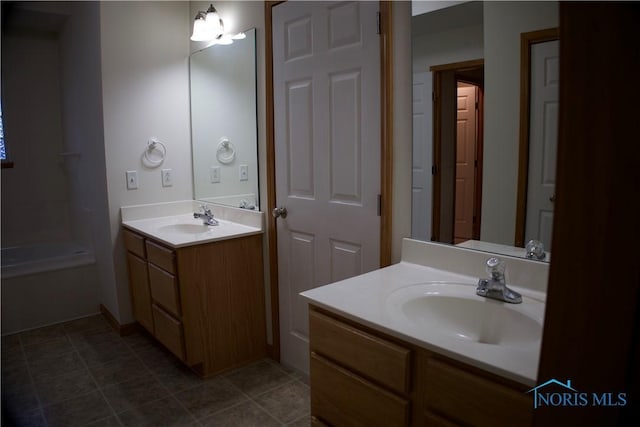 bathroom featuring vanity and tile patterned floors