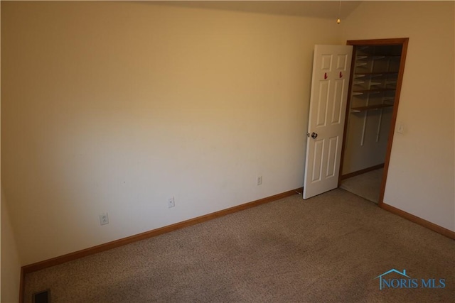 view of carpeted spare room