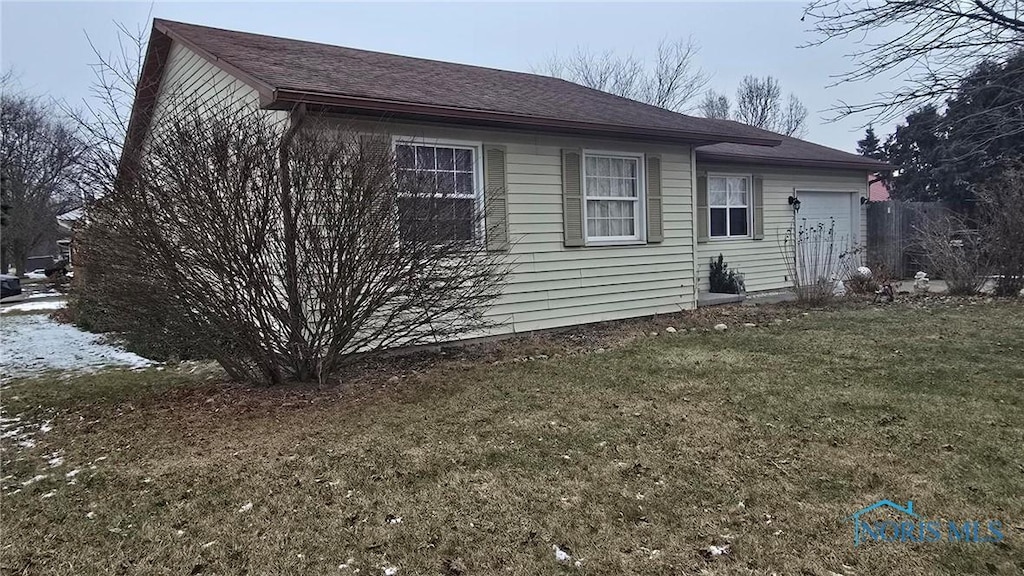 view of front of home with a front yard