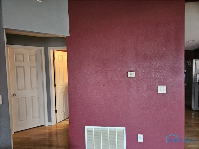 hall featuring hardwood / wood-style floors