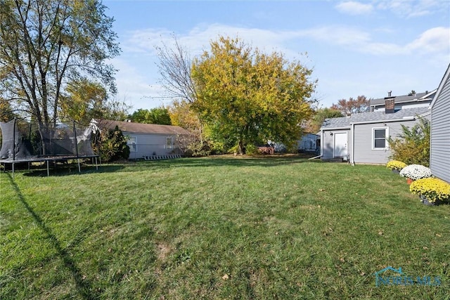 view of yard featuring a trampoline