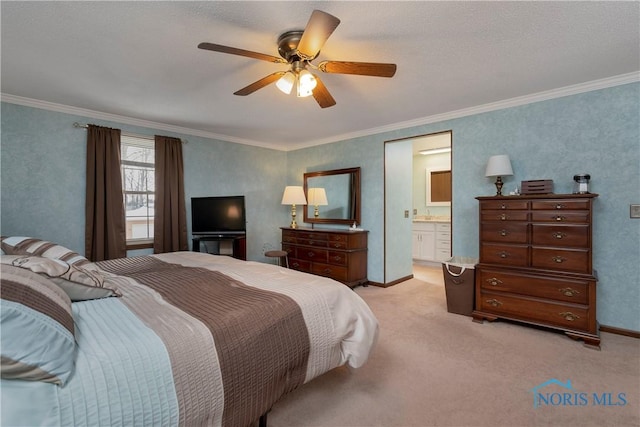 carpeted bedroom with connected bathroom, ceiling fan, and ornamental molding