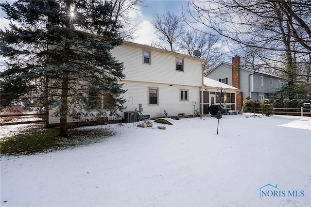 view of snow covered house