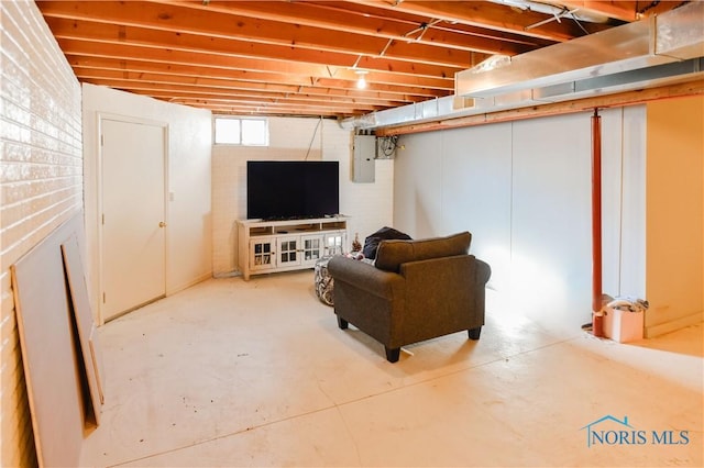 basement featuring electric panel