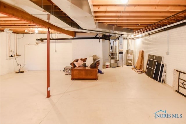 basement with heating unit and water heater