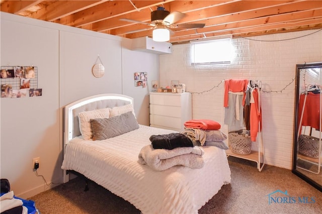 bedroom with ceiling fan and carpet floors