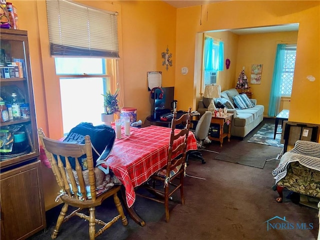 view of carpeted dining area