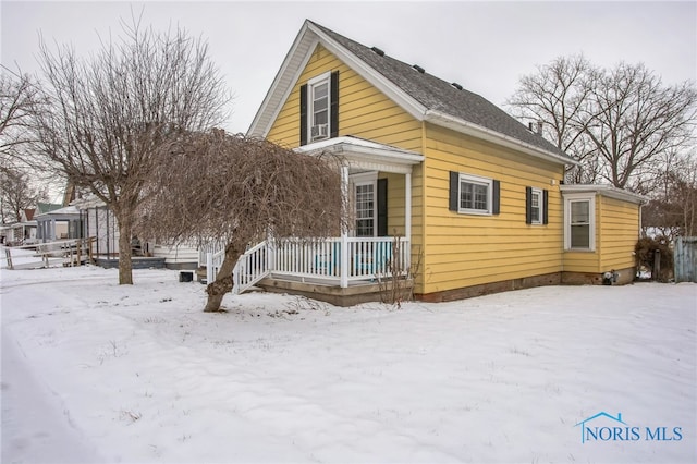 view of snow covered property