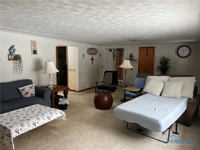 living room featuring light carpet and a textured ceiling