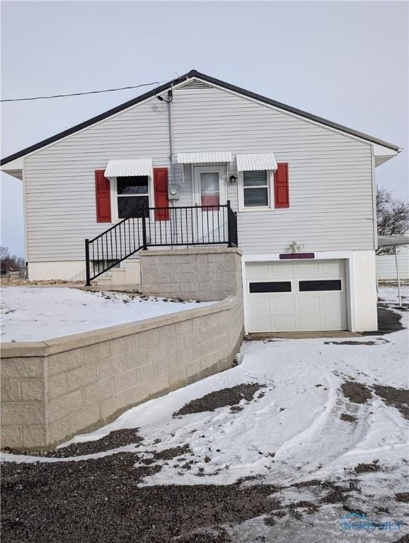 view of front of home featuring a garage