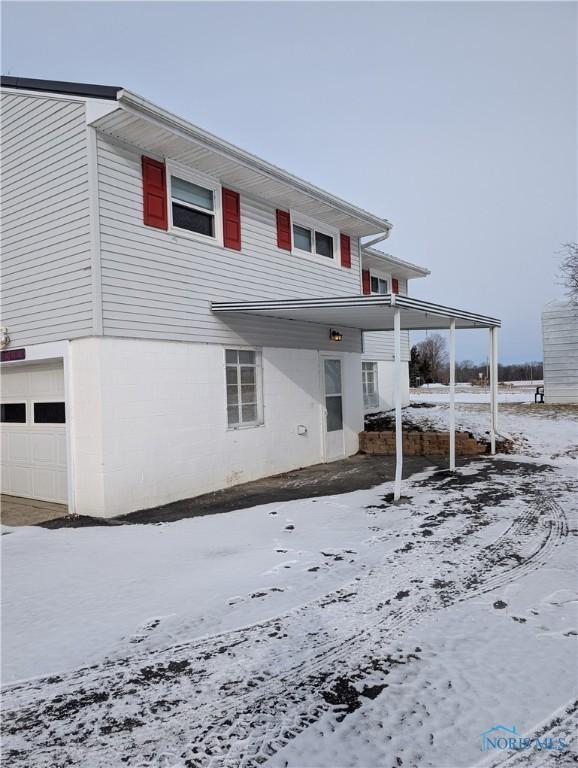 exterior space featuring a garage