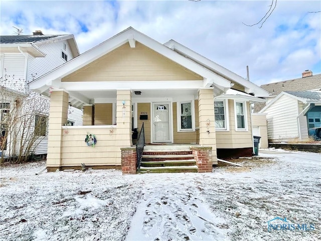 bungalow-style house with covered porch