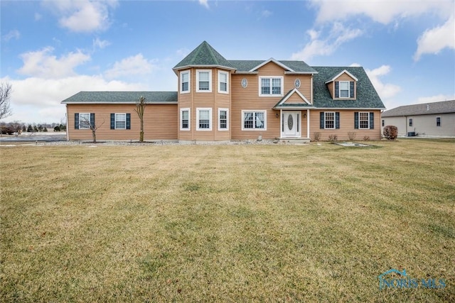 view of front of home featuring a front lawn