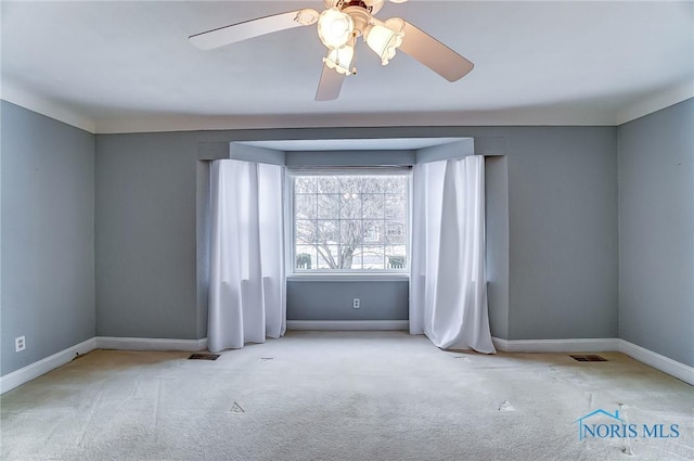 empty room with light colored carpet