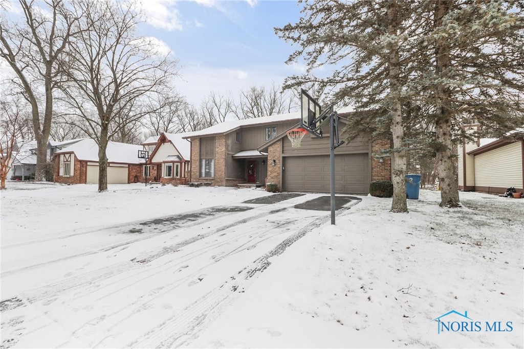 view of front of property with a garage