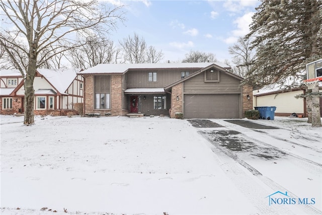 view of front of property with a garage