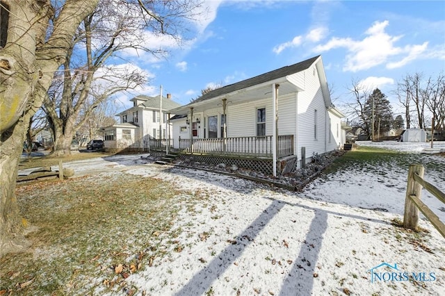 view of front of home featuring covered porch