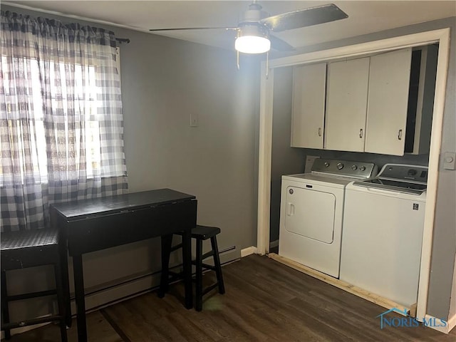 laundry room featuring cabinets, dark wood-type flooring, independent washer and dryer, and ceiling fan