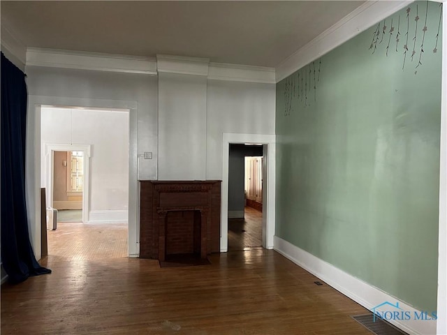 corridor featuring crown molding and dark hardwood / wood-style floors