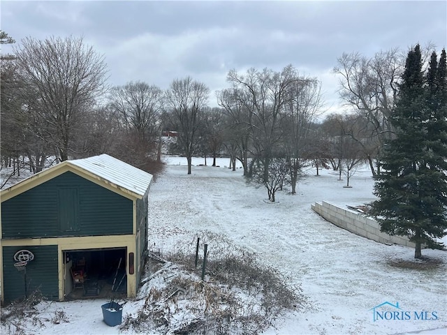 view of yard covered in snow