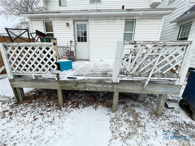 view of snow covered deck