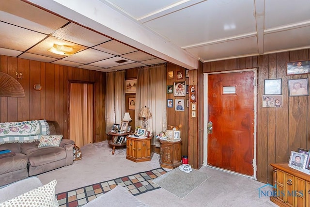 interior space with wooden walls and visible vents