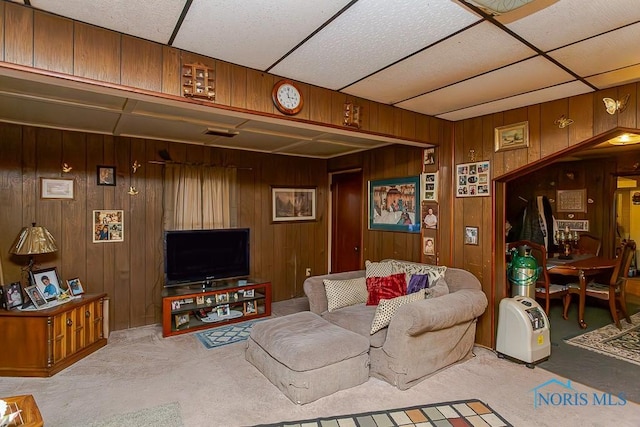 living area with carpet and visible vents