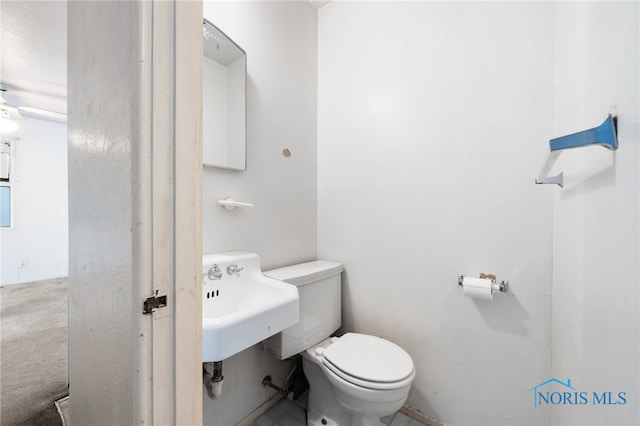 bathroom with sink and toilet