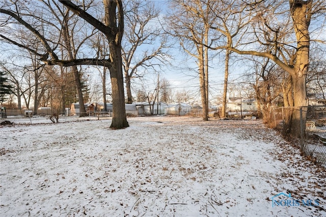 view of yard covered in snow