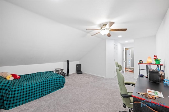 bedroom featuring ceiling fan, light colored carpet, and vaulted ceiling