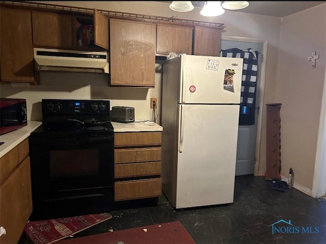 kitchen with white refrigerator and black electric range oven