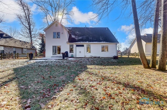 back of house featuring a yard and a patio