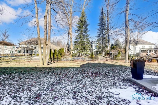 view of yard covered in snow