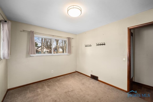 view of carpeted spare room