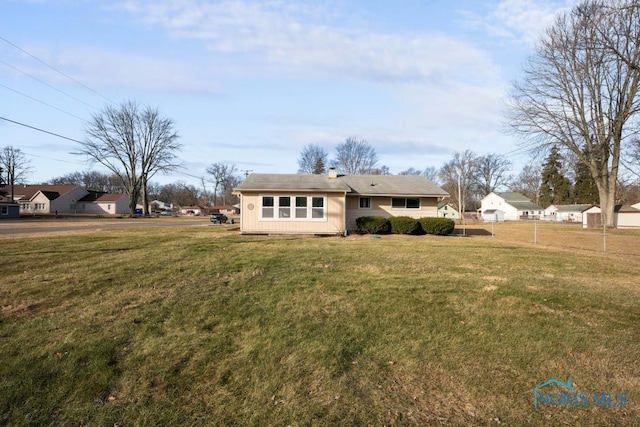 view of front of house featuring a front yard