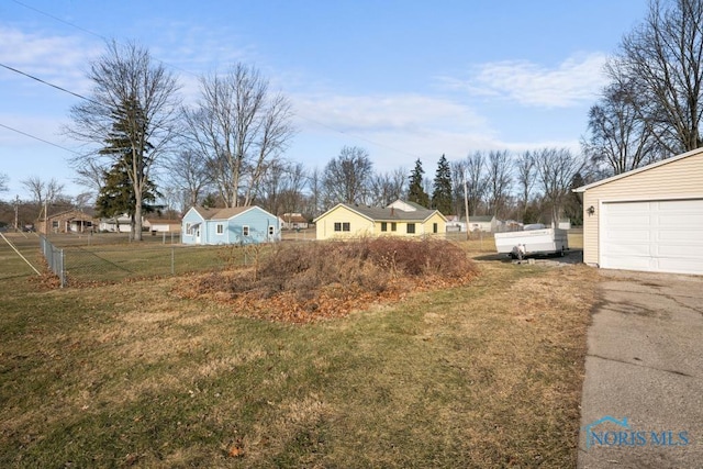 view of yard featuring a garage