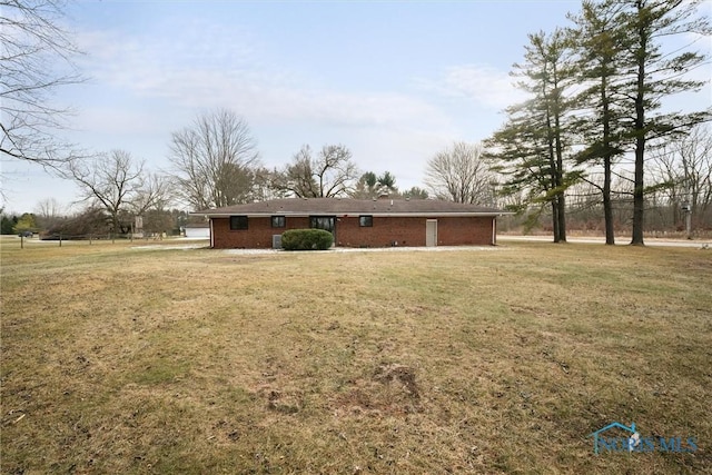 exterior space with a front lawn